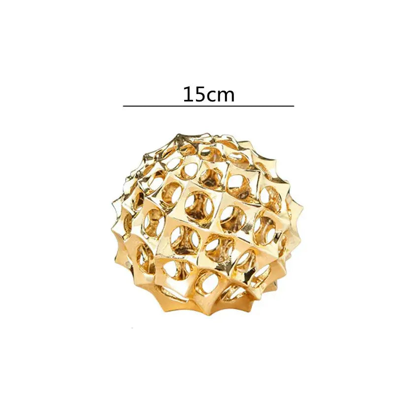 Golden 15cm abstract metal hollow ball spike ornament with geometric lattice design for living room decor