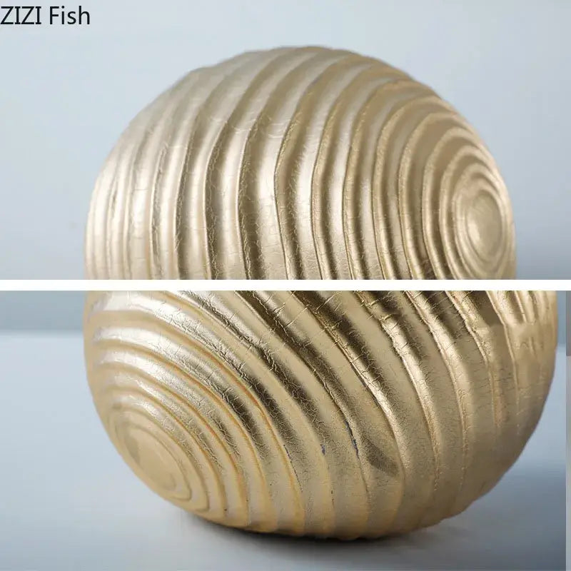 Abstract golden wave ball sculpture with concentric ridged patterns in ribbed metal decor for living room display