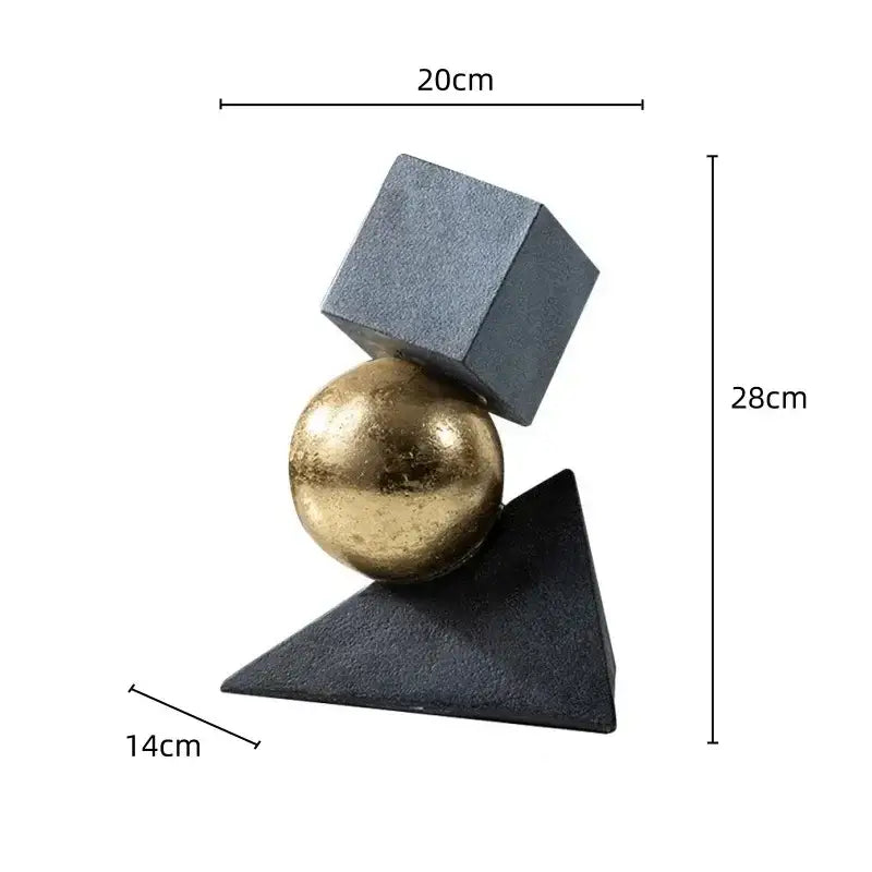 Abstract gray and gold ball sculpture with geometric gold ball atop a matte black triangular base for living room decorbites decor