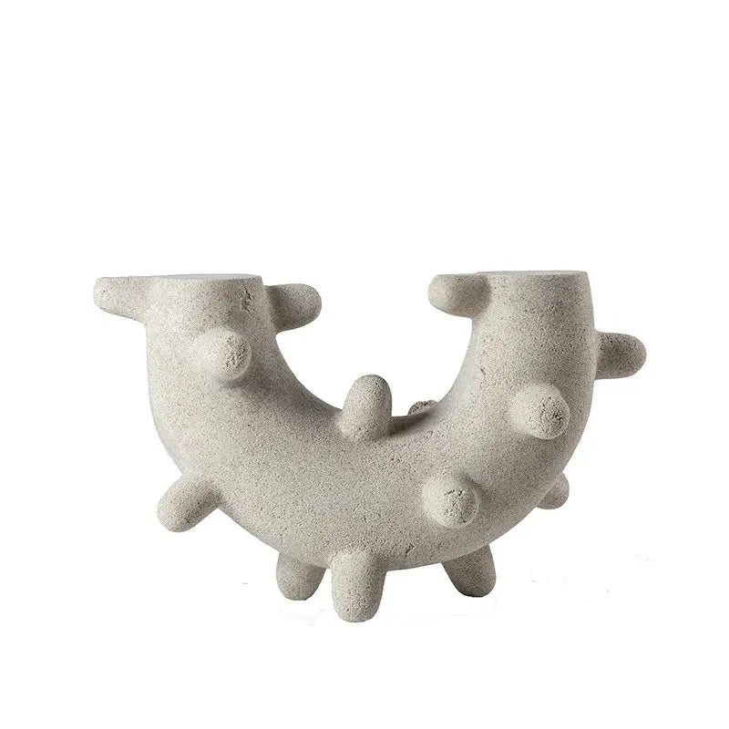 Gray concrete geometric cactus resin candle holder with textured surface and rounded protrusions for living room decor