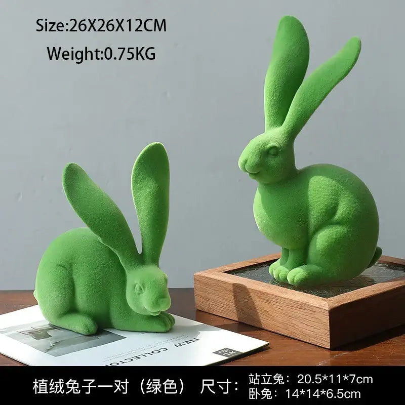 Pair of green plush abstract rabbit figurines in standing and sitting poses for living room resin decor art