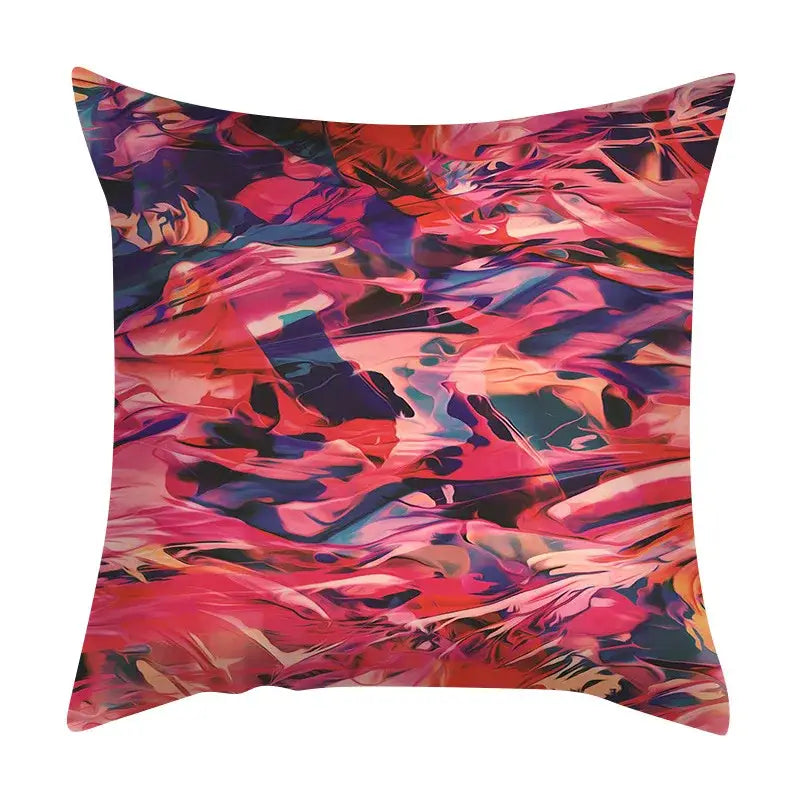 Vibrant decorbites abstract ink marbling cushion cover in bold pinks reds and deep purples for living room decor
