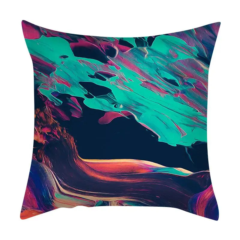 Vibrant decorbites abstract ink marbling cushion cover with swirling teal magenta and orange hues on navy background