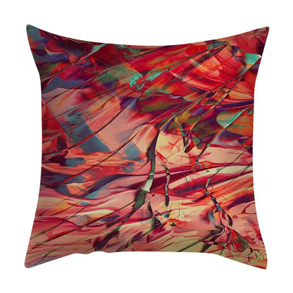 Vibrant abstract ink marbling cushion cover with swirling red pink teal and orange hues on textured fabric decorbites abstract ink throw pillow