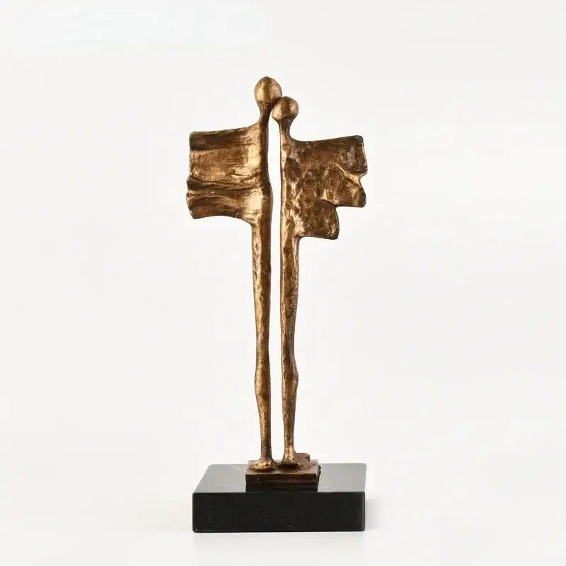 Bronze-colored abstract iron cast couple sculpture on black base decorbites abstract iron living room decor