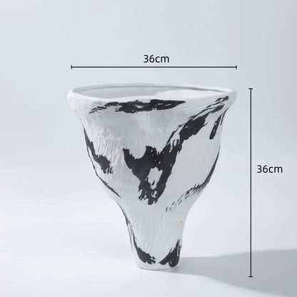 White ceramic vase with bold black brushstroke patterns and textured surface in abstract irregular vase set decorbites abstract irregular