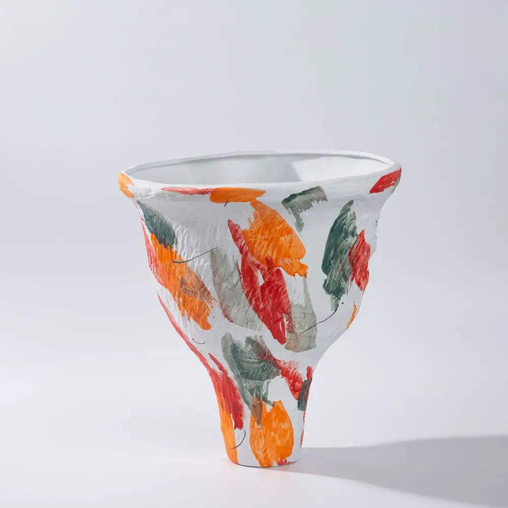 White ceramic abstract irregular vase set with flared rim and bold orange red green brushstrokes for living room decorbites decor