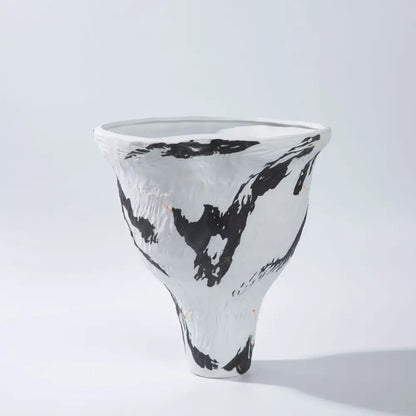 A white ceramic vase with bold black brushstroke patterns and textured surface from decorbites abstract irregular vase set for living room decor