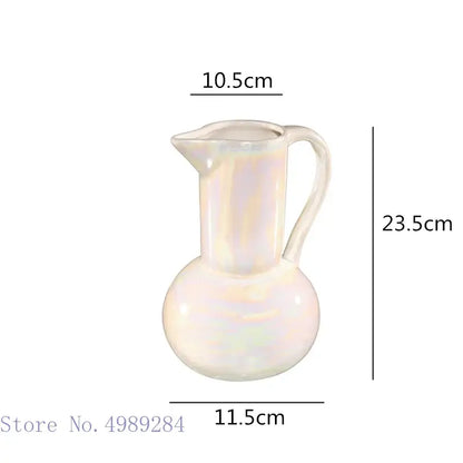 Abstract irregular white ceramic shell vase with iridescent finish and rounded body for decorbites ceramic shell decorbites ceramic