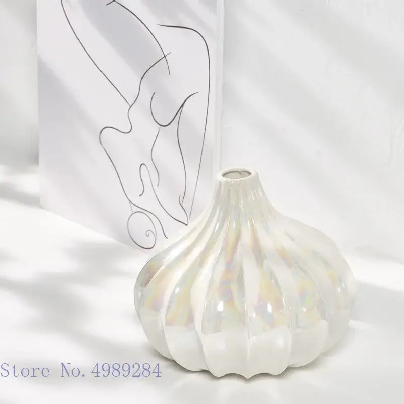 Abstract irregular white decorbites ceramic shell vase with pearlescent fluted design and iridescent finish for living room decor