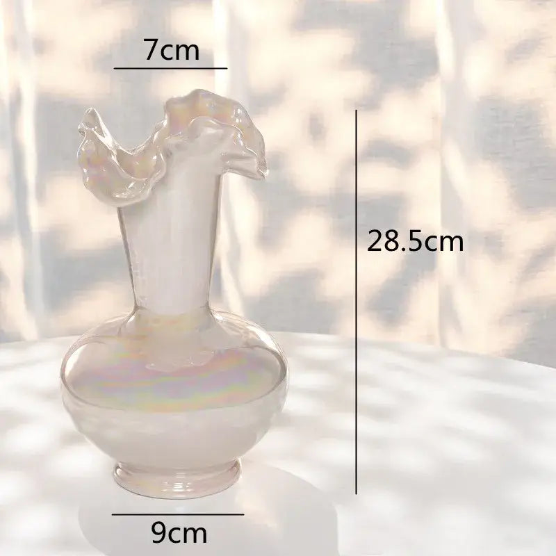 Abstract irregular white ceramic shell vase with a translucent iridescent glass flared rim base decorbites ceramic shell decor