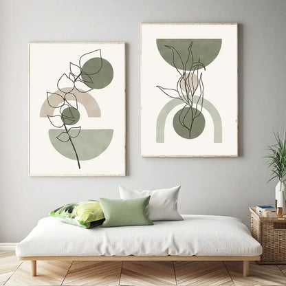 Two framed decorbites™ canvas wall art prints featuring abstract geometric botanical line drawings in sage green and beige