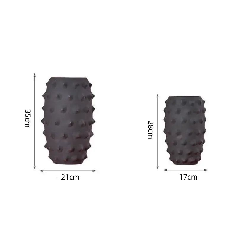 Dark gray sea urchin vase with textured spiky surface made of decorbites black ceramic for living room decor
