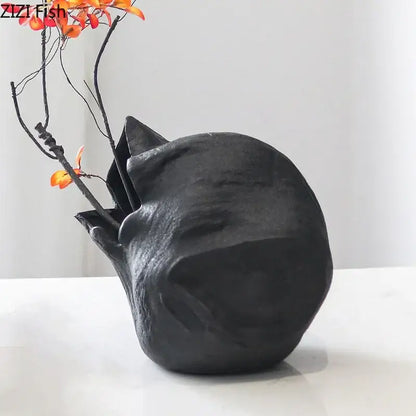 Black ceramic decorbites black vase shaped like a sleeping cat with abstract artwork matte finish for living room decor
