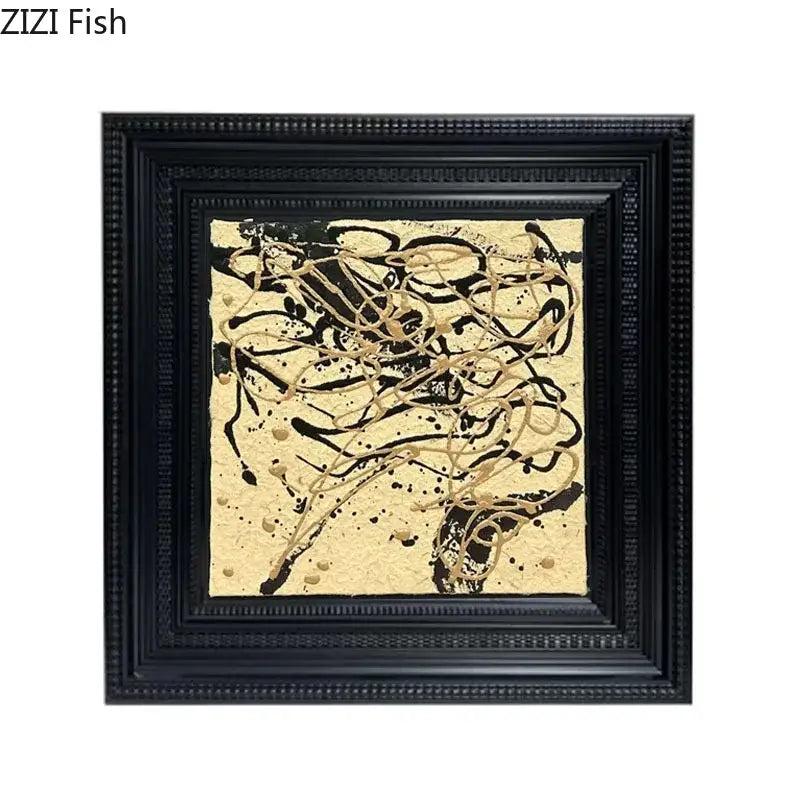 Black-framed wall art with dynamic black and gold swirls on textured beige background decorbites abstract modern wall