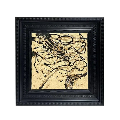Black-framed decorbites abstract modern wall art with dynamic black and gold swirls on textured beige canvas for living room decor