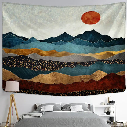 A textured wall hanging with abstract mountains oil painting in blue gold and red featuring a stylized orange sun
