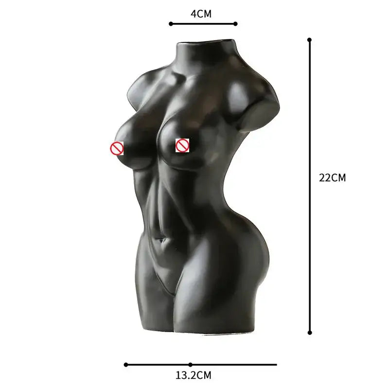 Black glossy resin abstract nude female torso sculpture with defined abs and smooth contours for living room decor