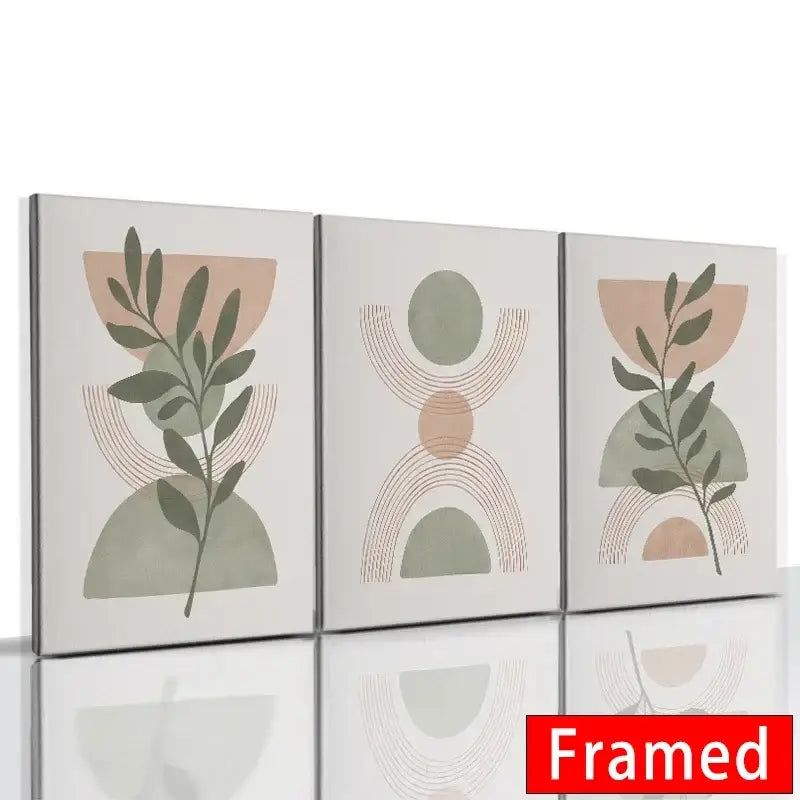 Set of three DecorBites™ abstract orange leaf posters with minimalist botanical designs on cream canvas prints