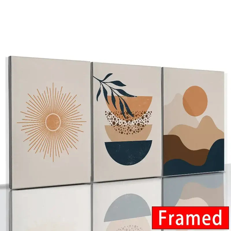 Set of three DecorBites™ abstract orange leaf posters featuring minimalist sunburst and mountain designs in earthy tones