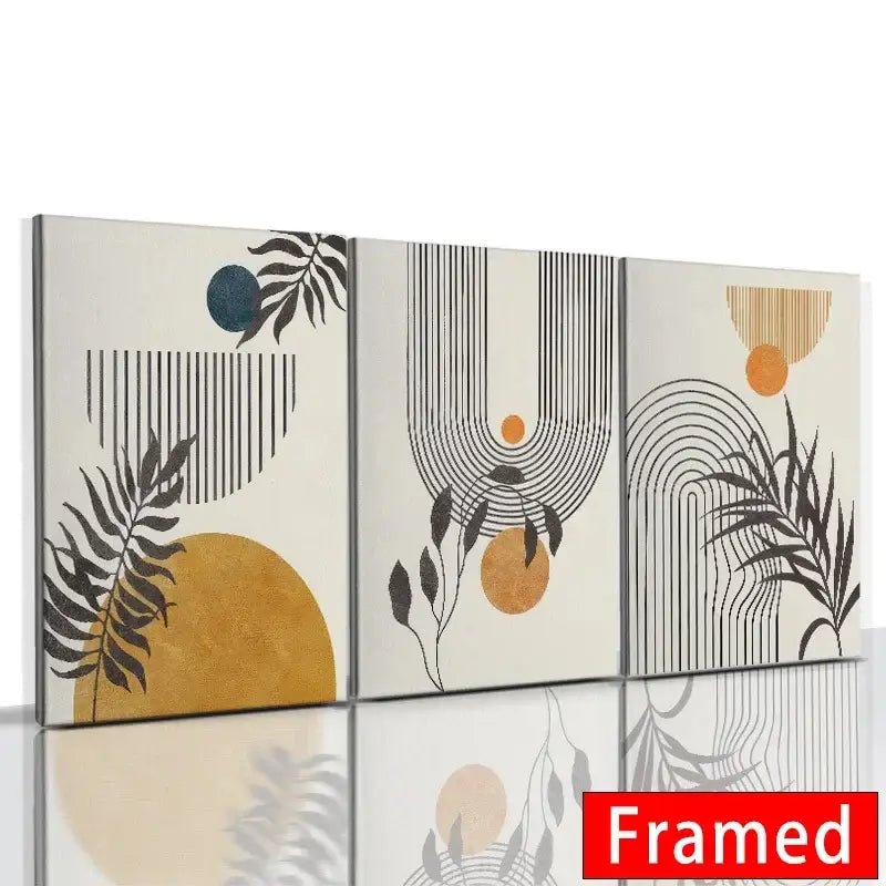 Set of three framed abstract orange leaf posters with black silhouettes gold and teal accents on cream background by DecorBites™