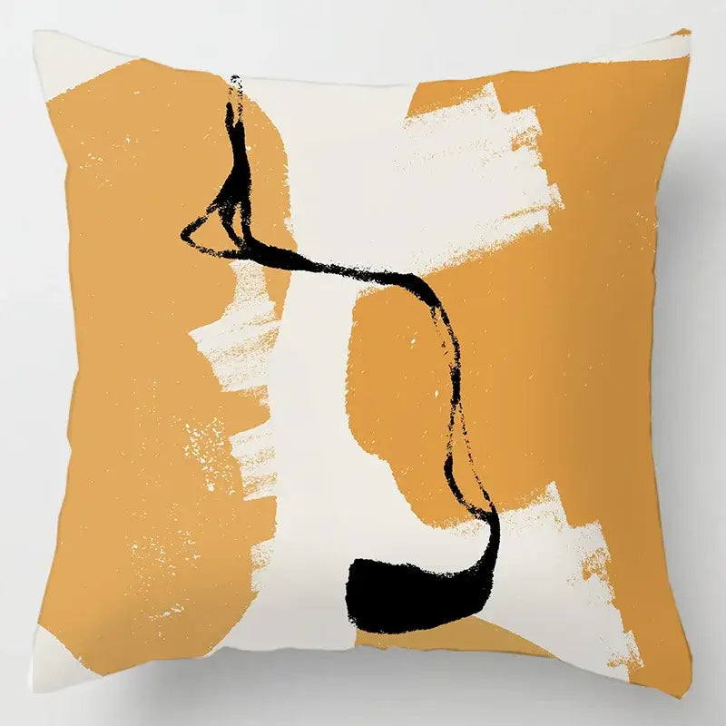A square cushion cover with geometric leaves print featuring bold orange, white, and black brushstroke patterns