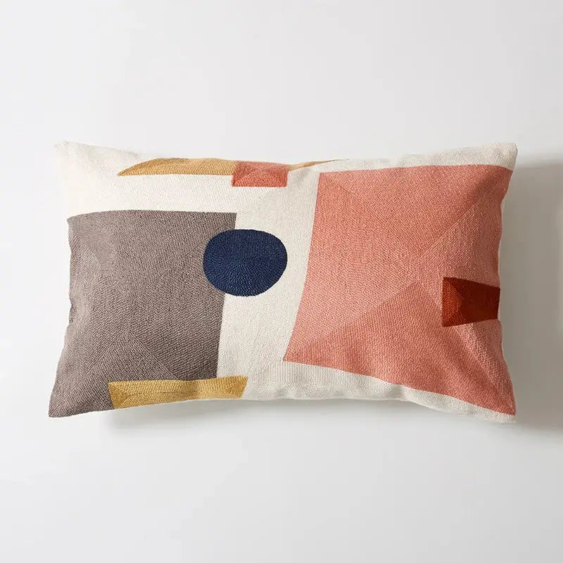 Rectangular cushion cover with a textured abstract geometric design in muted earth tones for living room decorbites geometric cushion