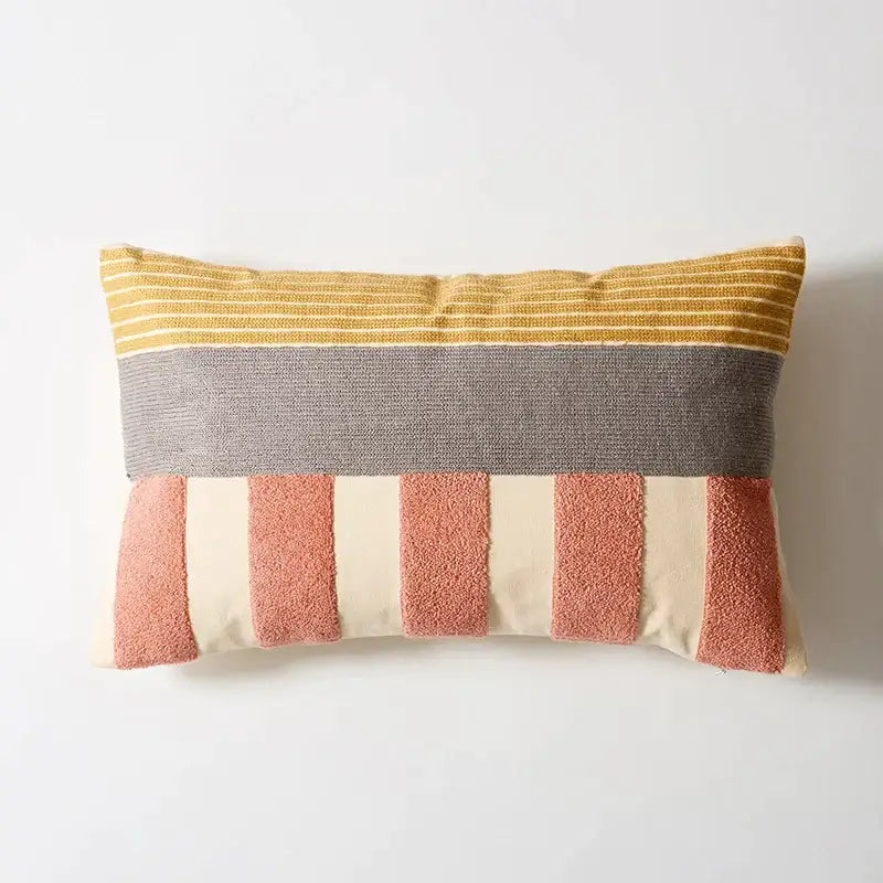 Abstract pastel geometric cushion cover featuring a rectangular decorbites geometric cushion with mustard yellow gray and terracotta stripes on cream background