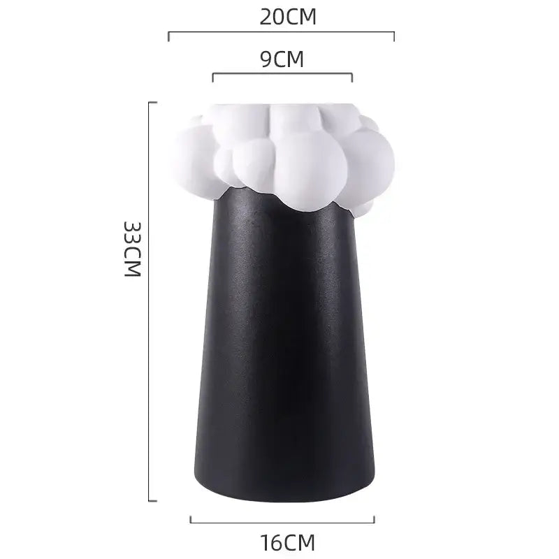 Black ceramic vase with white cloud-like textured top abstract patchwork ceramic decorbites abstract patchwork decor