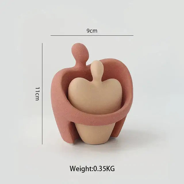 A terracotta-colored ceramic art couple statue with smooth matte finish and rounded contours for living room decor