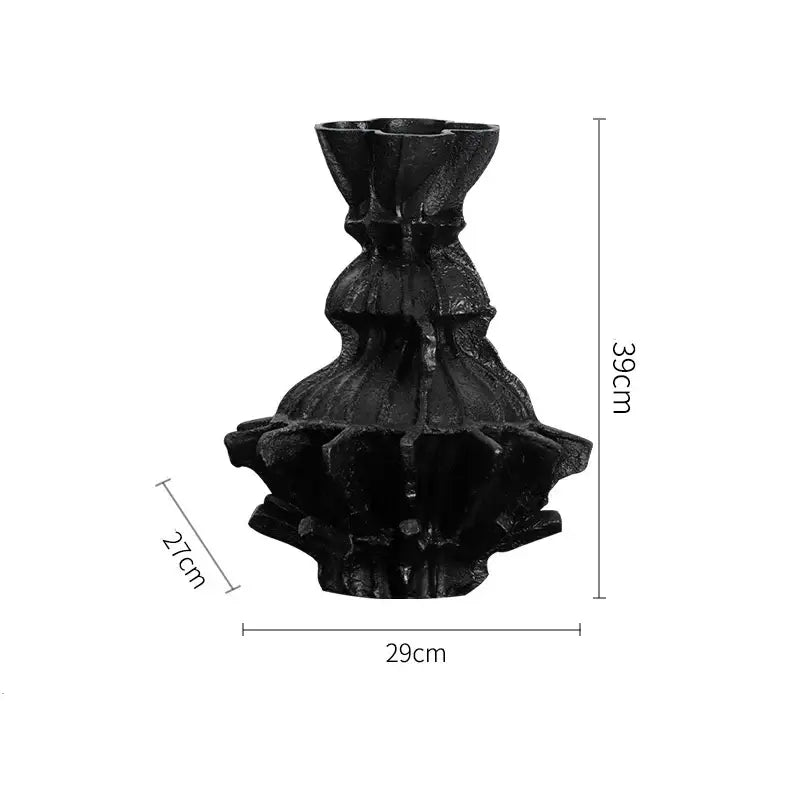 Black intricately textured ceramic vase with abstract pleated gear tiered fluted design for living room decor