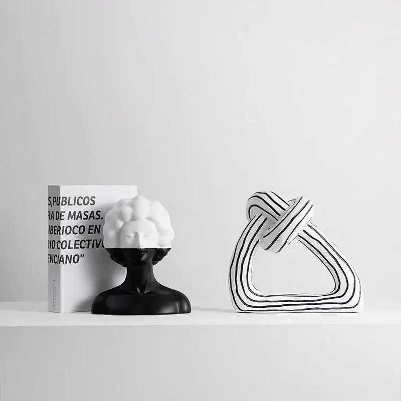 Black and white ceramic abstract portrait resin figure bookend with closed eyes for living room decor by decorbites