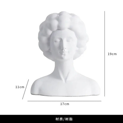 White resin abstract portrait bust sculpture with curly hair and serene expression for black and white living room decorbites abstract portrait