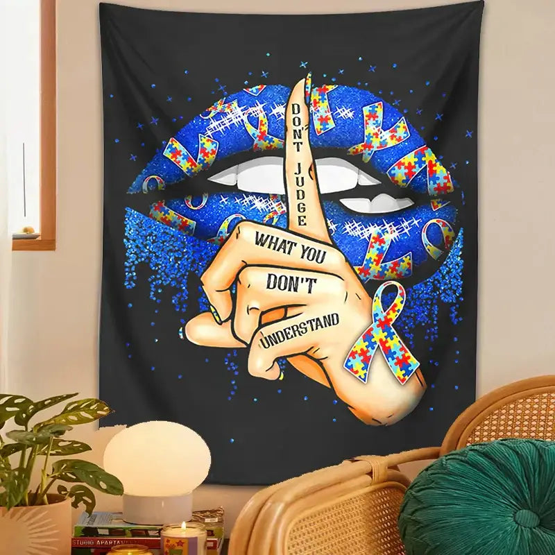 A black decorbites abstract psychedelic tapestry wall hanging with blue glitter lip and autism awareness ribbons on hand peace sign
