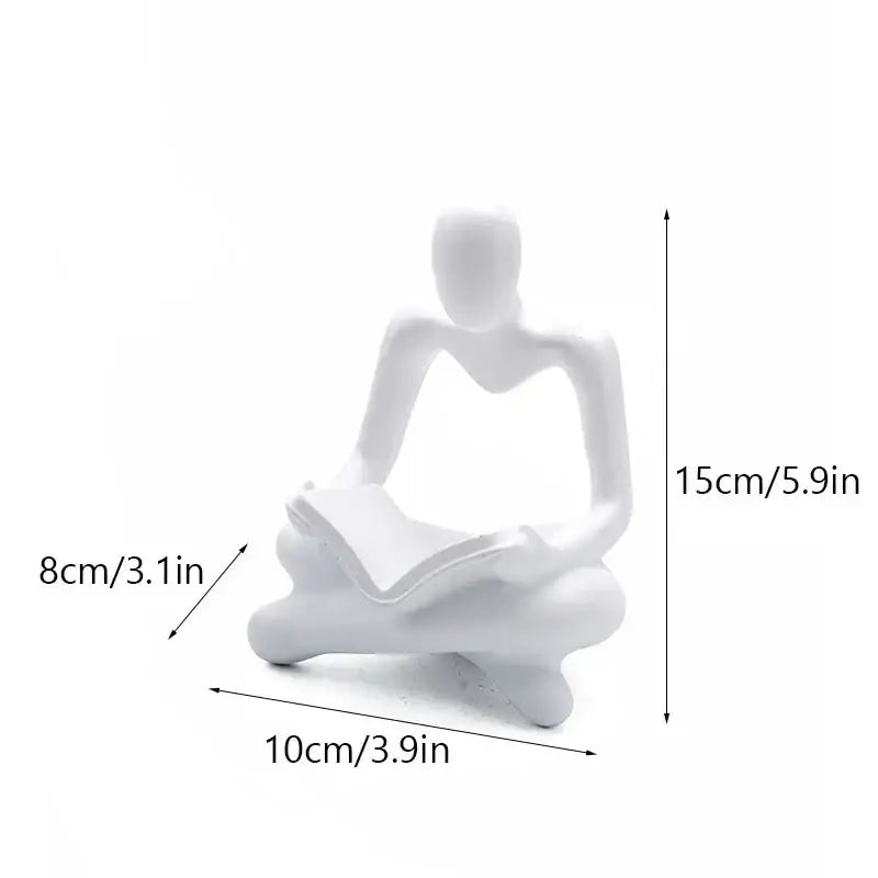 White ceramic abstract resin book figurine of a seated person reading for decorbites abstract resin office decorbites abstract resin book