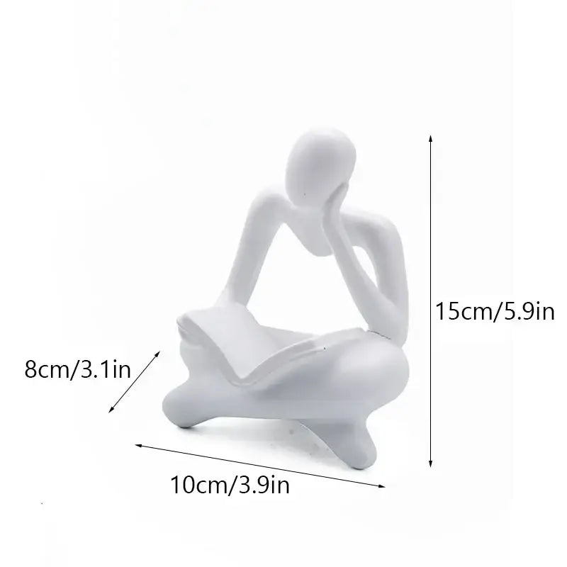 White abstract resin book figurine of a seated thinker holding an open book for decorbites office decorbites abstract resin