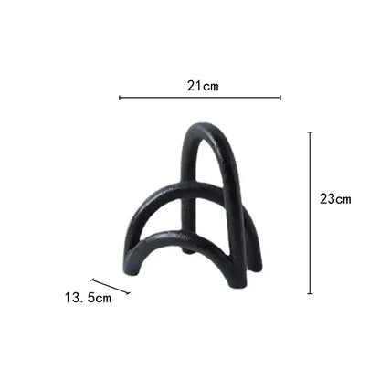 Black wrought iron plant stand with curved interlocking arches for decorbites abstract resin geometry arch use