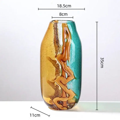 A tall abstract ripple glass vase in amber and teal with swirling golden patterns for living room decorbites decor