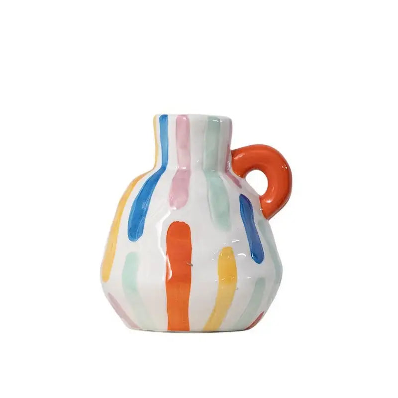 Colorful ceramic vase teapot with glossy finish and pastel vertical stripes accented by an orange handle decorbites cartoon ceramic