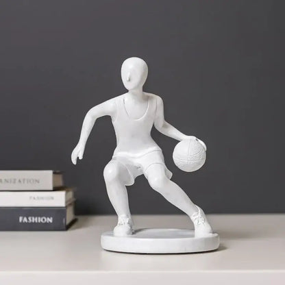 White resin sports player sculpture in dynamic dribbling pose on circular base for decorbites abstract sports decor