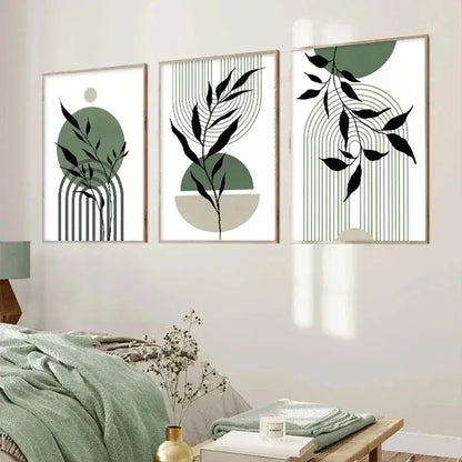 Three framed minimalist botanical art prints with black leaf silhouettes on abstract green and beige geometric backgrounds