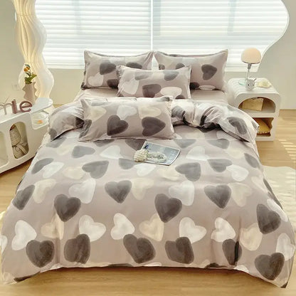 A cozy gray duvet cover with a soft heart-patterned design in white and dark gray by decorbites cute pattern