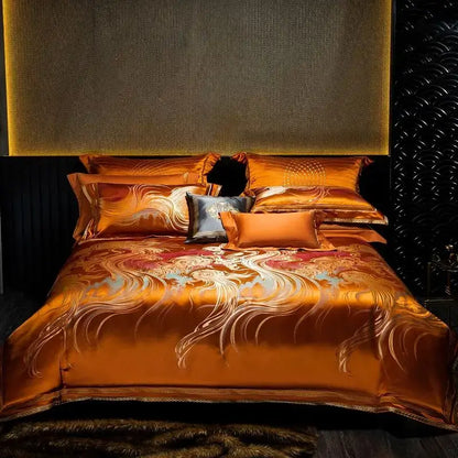Golden satin duvet cover set with intricate white and light blue swirling patterns and a luxurious sheen for bedroom decor