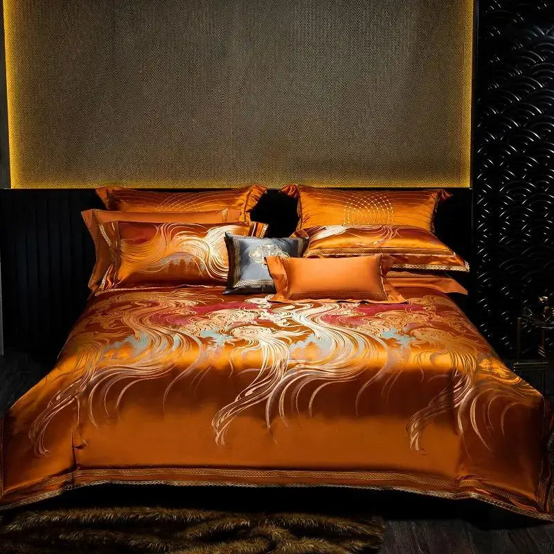 Golden satin duvet cover set with intricate white and light blue swirling patterns and a luxurious sheen for bedroom decor