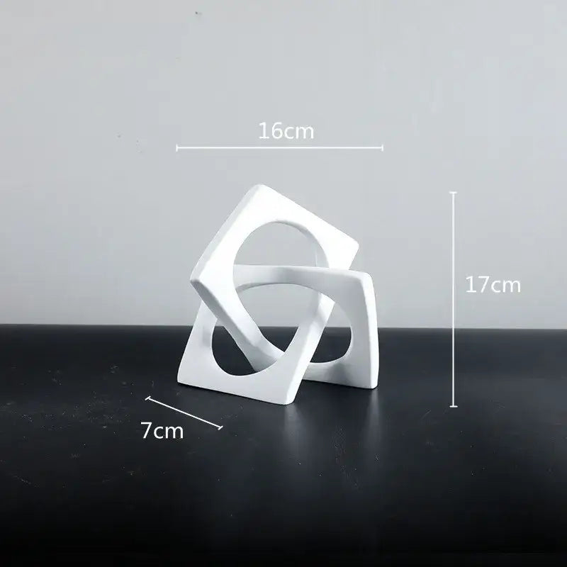 Abstract white ceramic geometric cross square ring bookends featuring interlocking square shapes for living room decorbites geometric cross