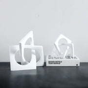 White ceramic bookends with abstract geometric cross square ring design for living room decorbites geometric cross decor