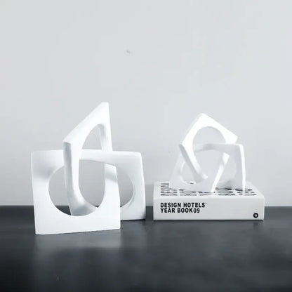 White ceramic bookends with abstract geometric cross square ring design for living room decorbites geometric cross decor