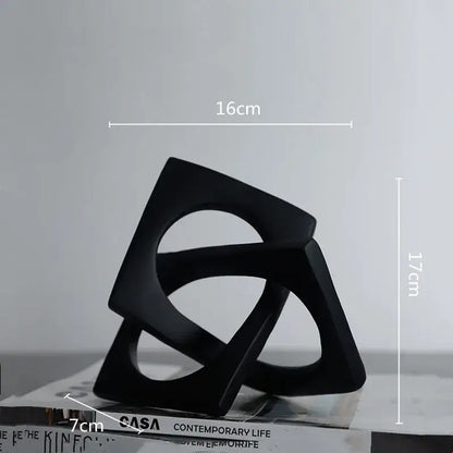 Black matte-finished abstract geometric cross square ceramic ring bookends for living room decorbites geometric cross design