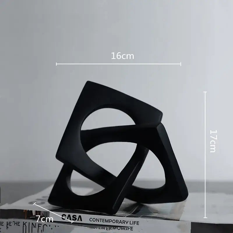 Black matte-finished abstract geometric cross square ceramic ring bookends for living room decorbites geometric cross design
