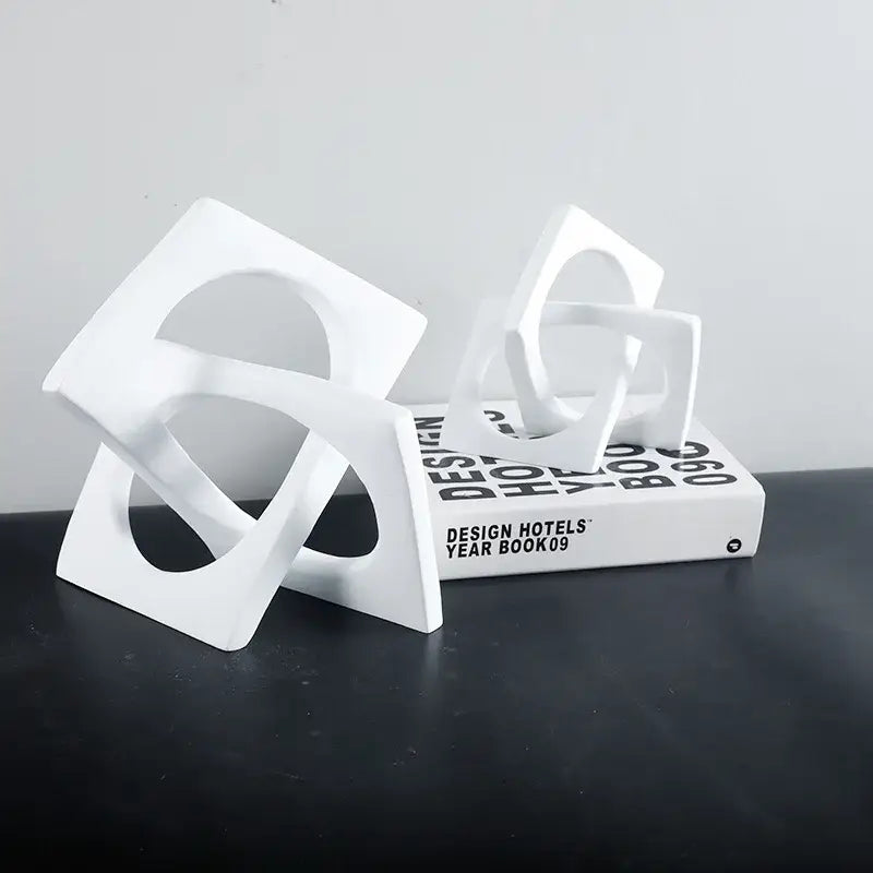 Abstract white ceramic geometric cross square ring bookends with interlocking square and circular forms for living room decorbites geometric cross
